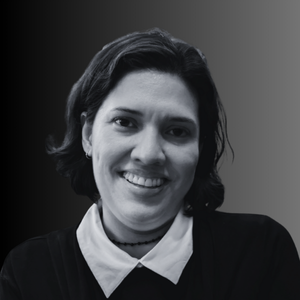 Black and white portrait of a person with a plain background