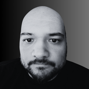 Black and white portrait of a person with a neutral expression