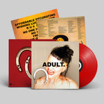 Vinyl record with a red sleeve featuring a graphic design and text.