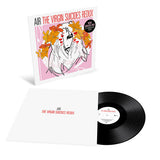 Vinyl record with cover featuring artistic design and text on a white background