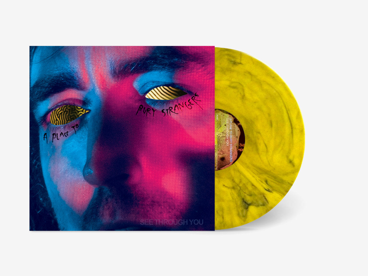 Vinyl record with a colorful design of a face on the cover