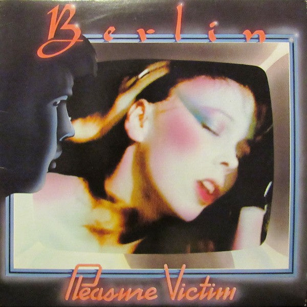 Album cover for 'Pleasure Victim' by Berlin featuring a woman's face on a television screen.