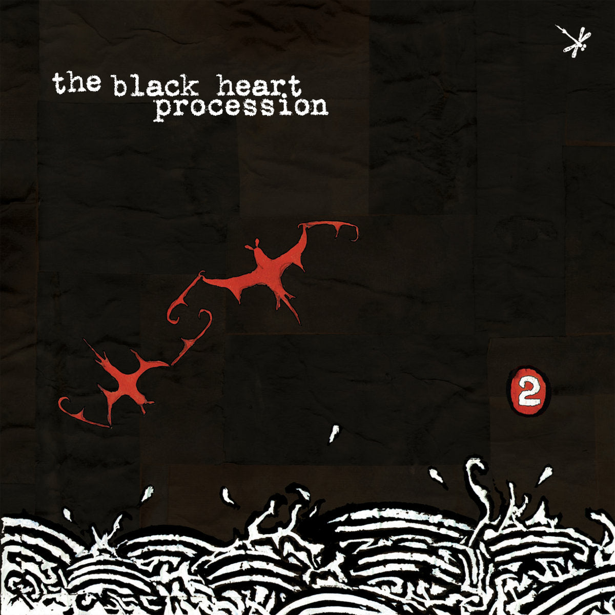 Album cover for 'the black heart procession' with red abstract bat shapes and text on a textured black background.