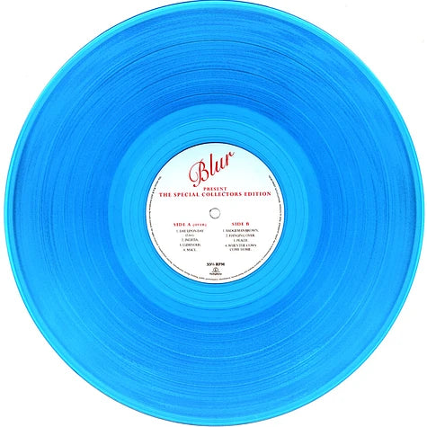 Blue vinyl record with a white label on a white background with the text 'Blur' in cursive.