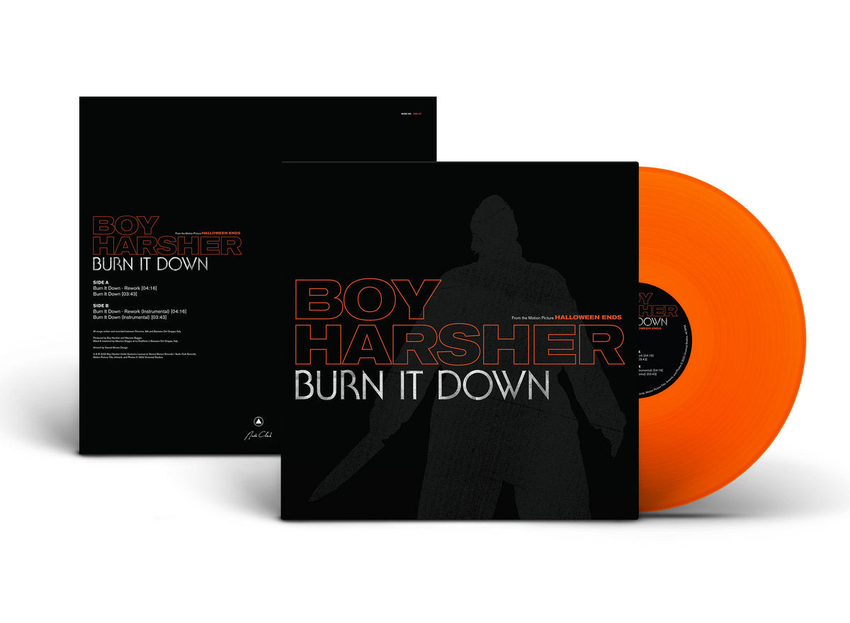 Vinyl record with orange disc and black cover featuring 'Boy Harsher' and 'Burn It Down'.