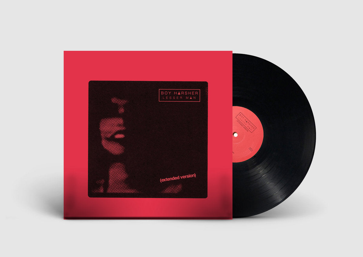 Vinyl record with red cover on a light gray background