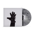 Vinyl record with cover eaturing a black silhouette of a spiky gloved hand on a white background