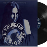 Vinyl record with a cover featuring a person and album art, on a white background.