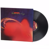 Vinyl record with colorful cover featuring 'Heaven or Las Vegas' text