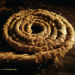 Album cover for 'Recoiled' by Coil with Nine Ince Nails featuring a close-up of a coiled piece of rope on a dark background