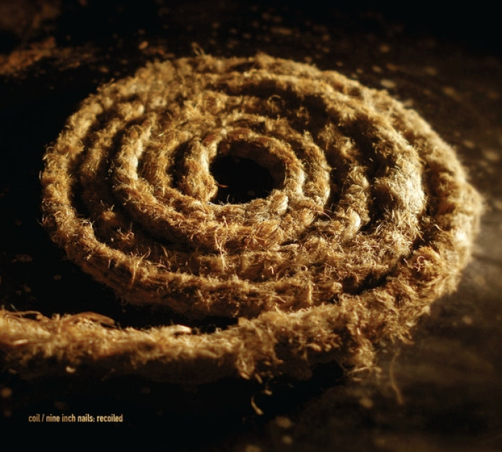 Album cover for 'Recoiled' by Coil with Nine Ince Nails featuring a close-up of a coiled piece of rope on a dark background