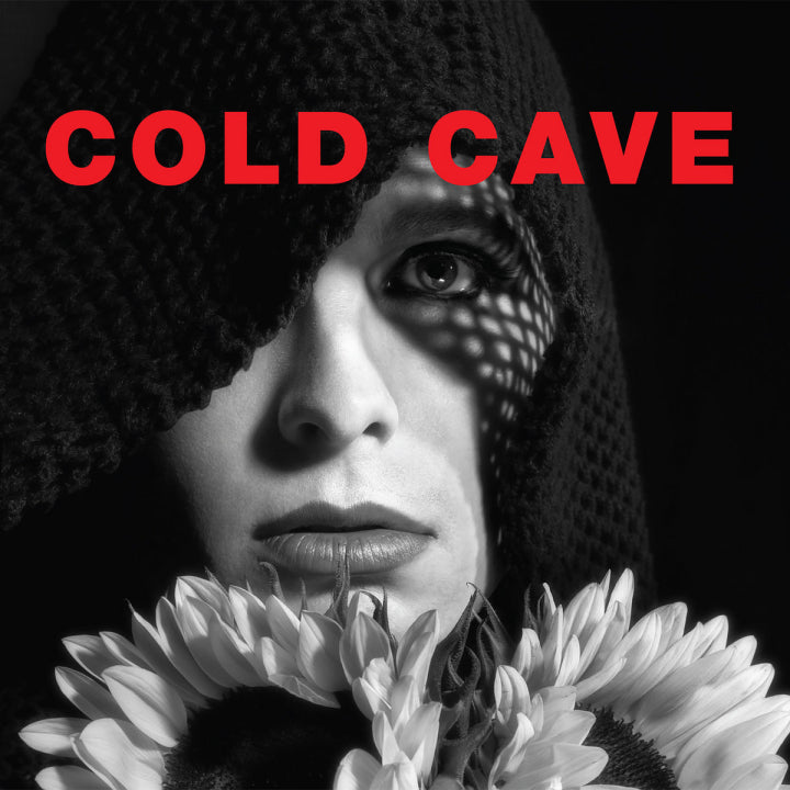 Album cover for 'Cherish The Light Years' by Cold Cave with a person wearing a textured hat and sunflowers, featuring the text 'Cold Cave'.