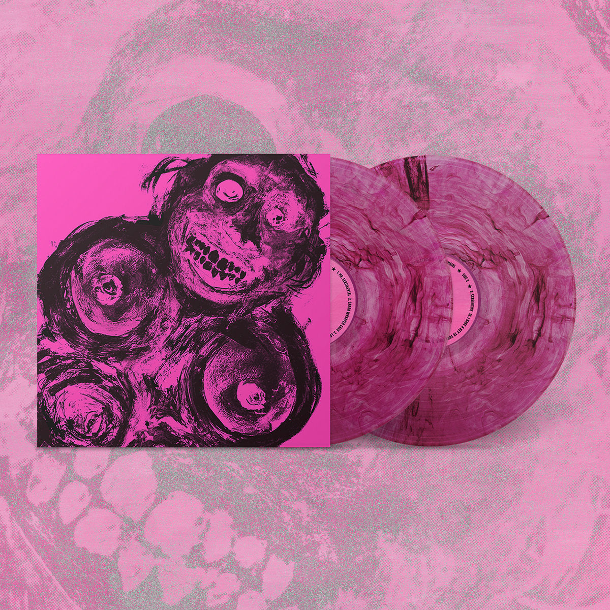 Vinyl record with pink and black design on a matching pink background