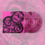 Vinyl record with pink and black design on a matching pink background