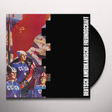 Vinyl record with a colorful cover featuring people in sports attire and text on a gray background