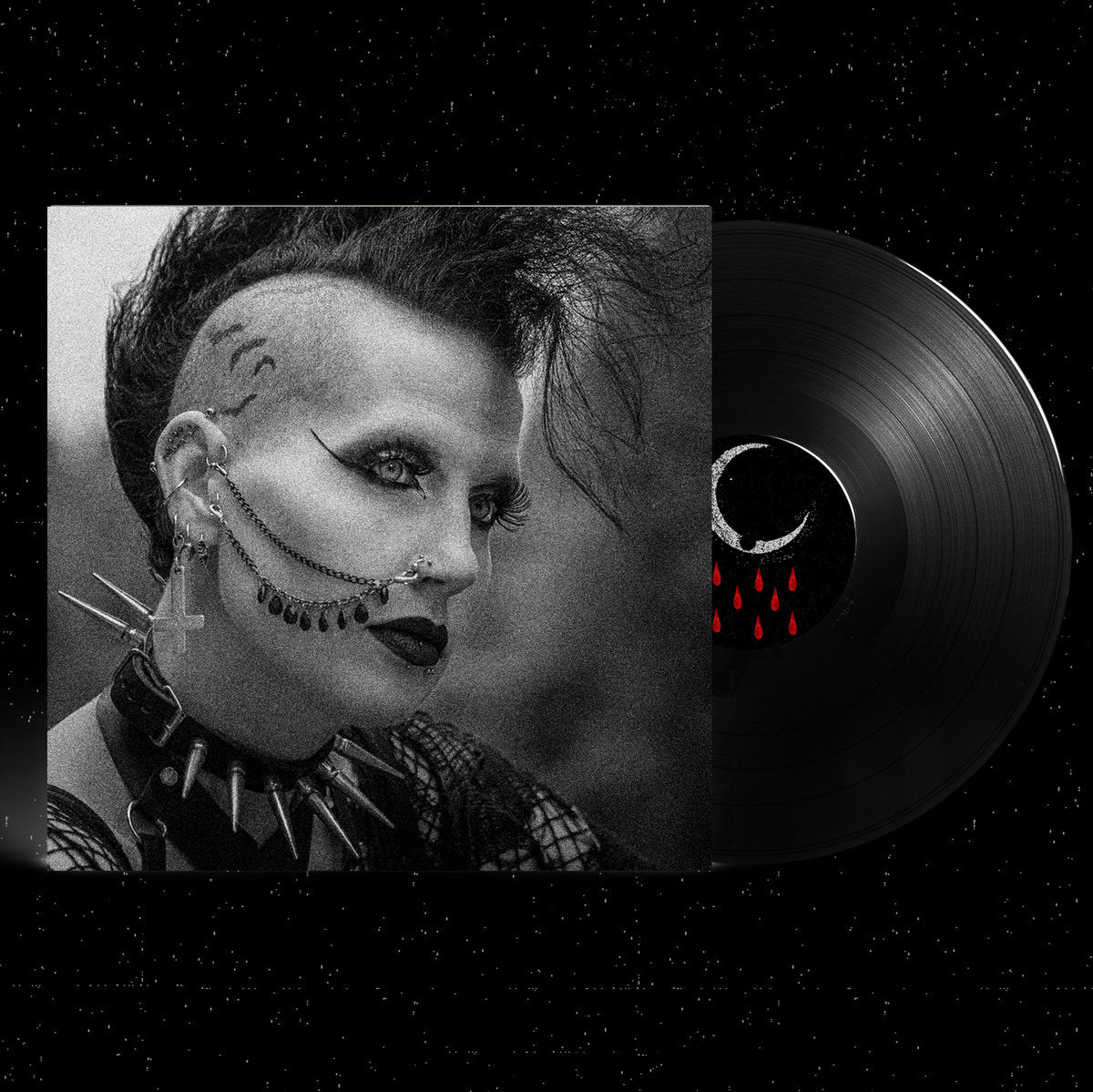 Vinyl record with a stylized face design on a black background