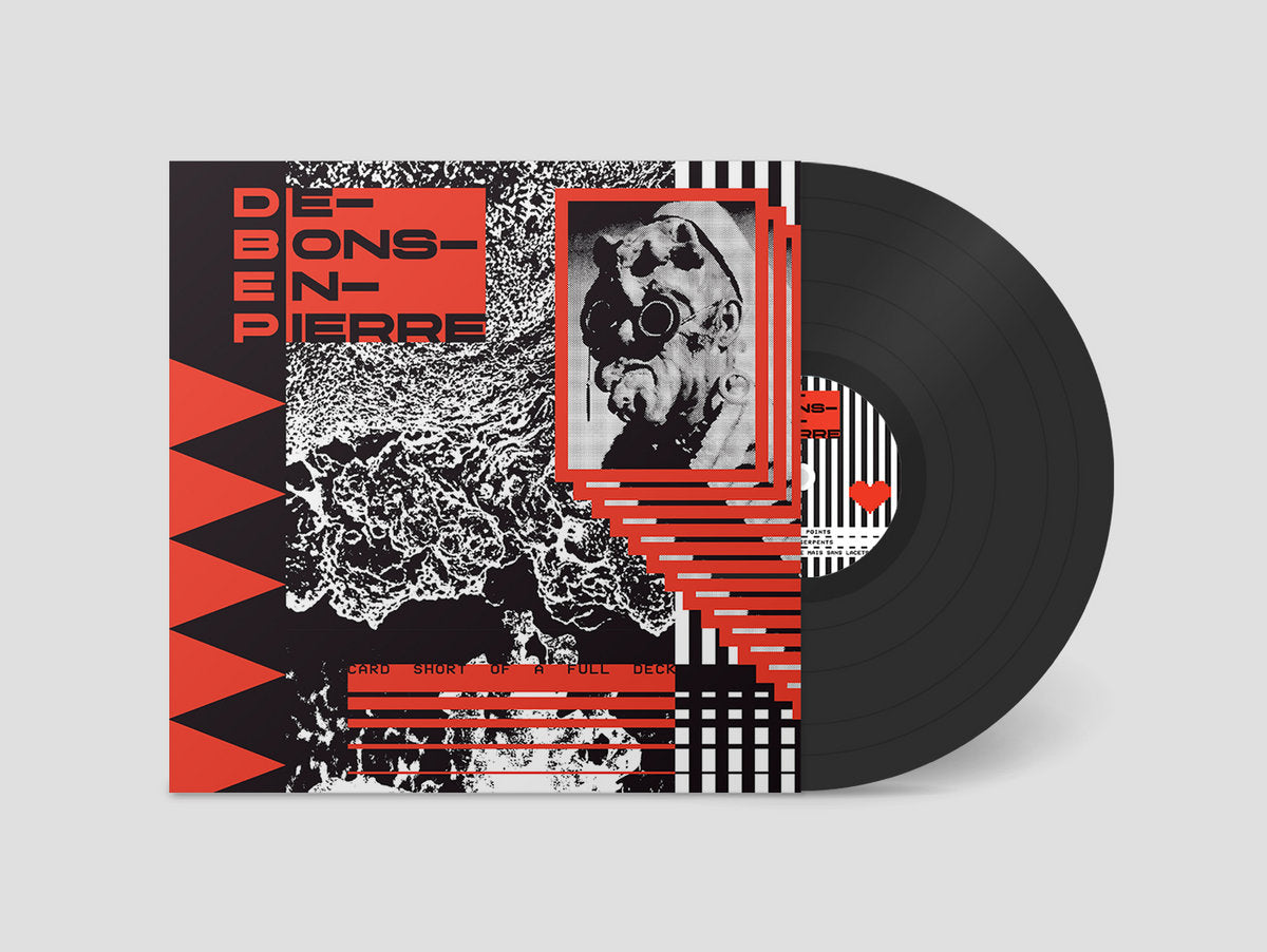 Vinyl record with a geometric red, black, and white cover featuring text and abstract designs.