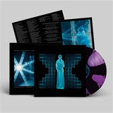 Vinyl record with cover featuring a person and abstract designs on a gray background