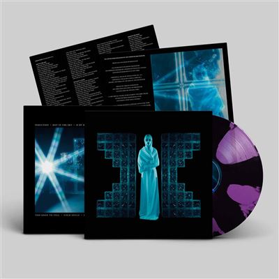 Vinyl record with cover featuring a person and abstract designs on a gray background