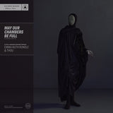 Album cover for Emma Ruth Rundle and Thou's "May Our Chambers Be Full" with a figure draped in black fabric against a dark background, featuring text on the left side.