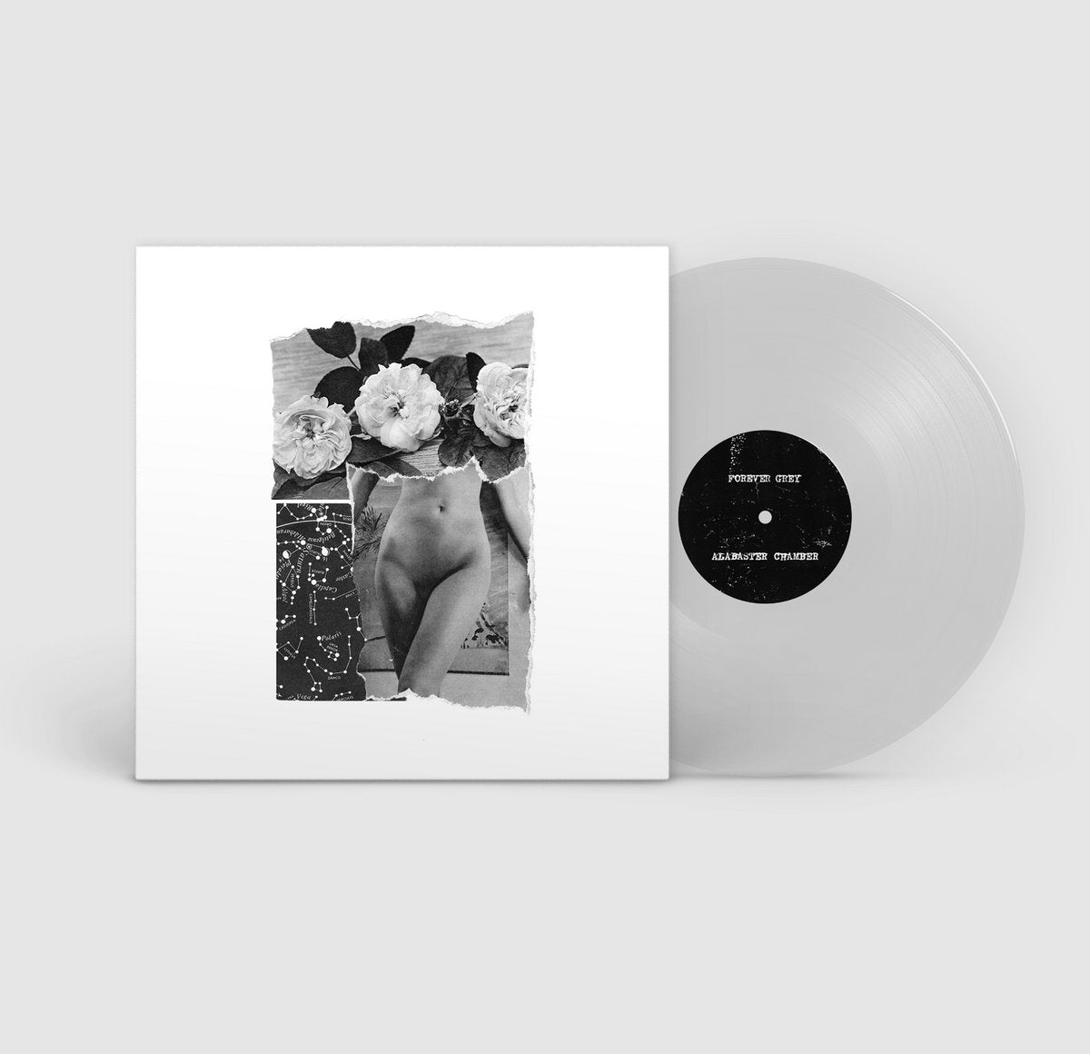 Vinyl record with a white cover featuring black and white floral and portrait design on a light gray background.