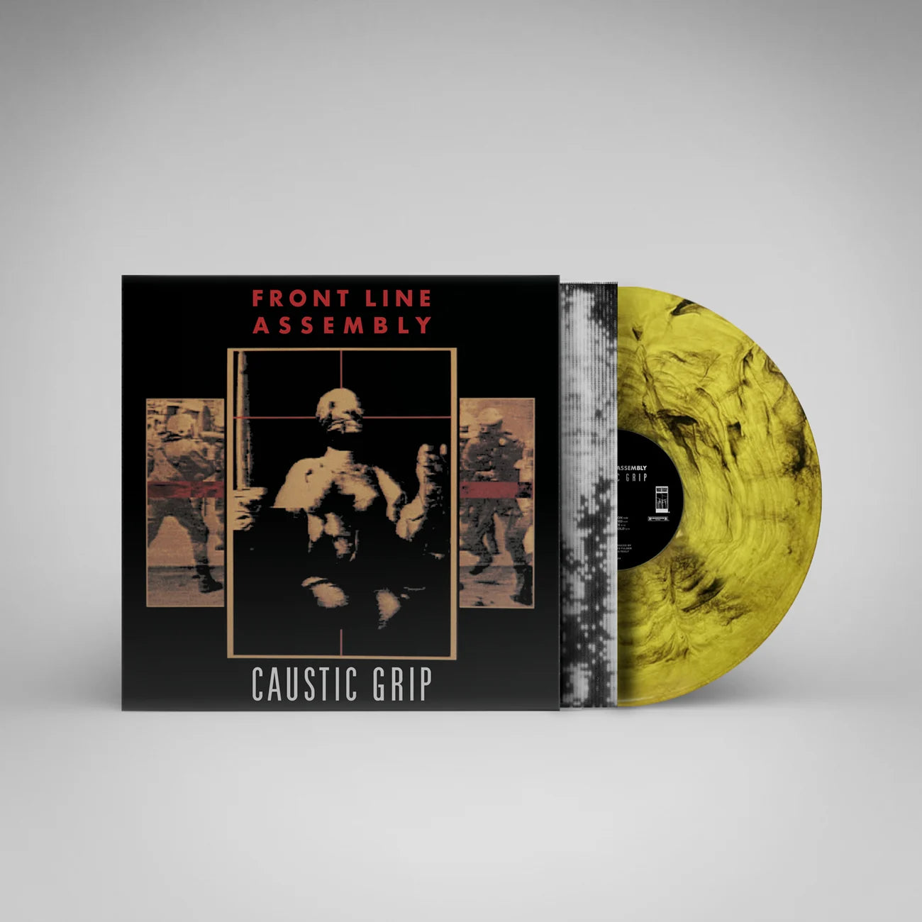 Vinyl record with a black and yellow cover featuring 'Front Line Assembly' and 'Caustic Grip'.