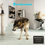 Album cover for Grinderman's 'Grinderman 2' with a wolf in an elegant interior setting.