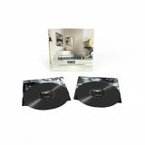 Vinyl records with 'Grinderman 2 RMX' cover on a white background