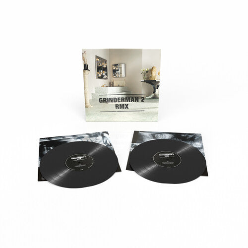 Vinyl records with 'Grinderman 2 RMX' cover on a white background
