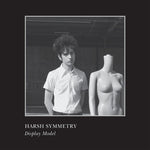 Album cover for 'Display Model' by Harsh Symmetry featuring a black and white photo of a person standing next to a mannequin with 'Harsh Symmetry' text.