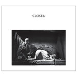 Album cover for 'Closer' by Joy Division with a black and white scene of a person lying down.