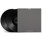 Two black vinyl records with a gray cover on a white background