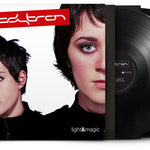 Vinyl record set with a cover featuring two faces and the title 'Light & Magic'.