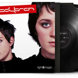 Vinyl record set with a cover featuring two faces and the title 'Light & Magic'.