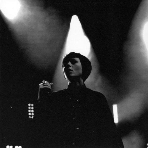 Album cover for 'Live At London Astoria' by Ladyron featuring a black and white photo of a person on stage with dramatic lighting