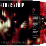 Vinyl record with red and black design and cover featuring abstract art.