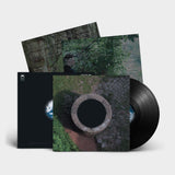 Picture of Lebanon Hanover - Besides the Abyss black vinyl with album cover featuring a circular stone structure and nature-themed design.