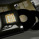 The London Suede - Dog Man Star (30th Anniversary Edition black vinyl records with cover and text on a dark surface