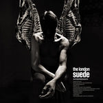 Album cover with a person sitting between two hanging animal carcasses, featuring the text 'The London Suede - Antidepressants'