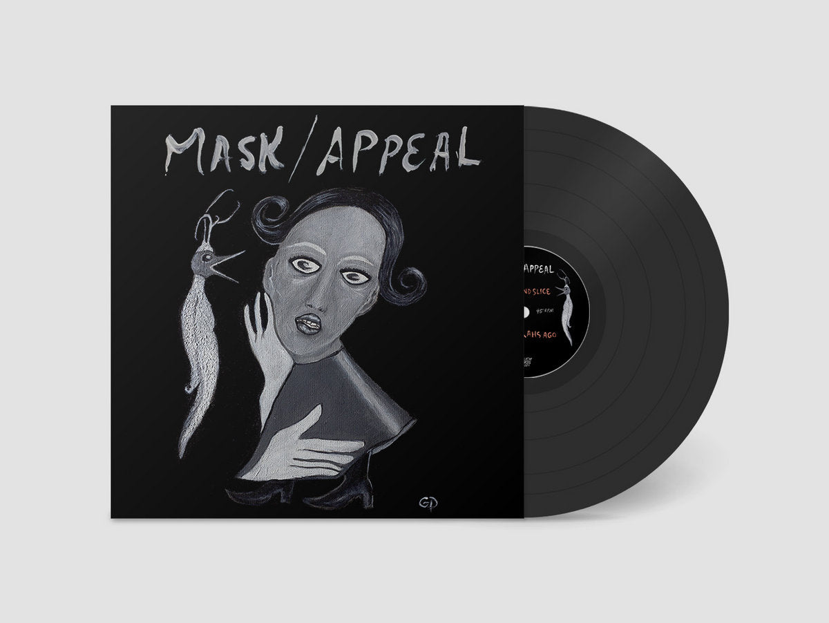 Vinyl record with 'Mask Appeal' cover featuring a stylized illustration of a woman and a fish.