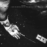 Black and white image of a hand with a bandage holding a knife, with text 'i sure am getting sick of this bowling alley' by mclusky.