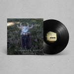 Vinyl record with cover featuring a creature in a field on a gray background