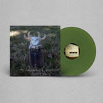 Green vinyl record with a cover featuring a creature in a field on a gray background