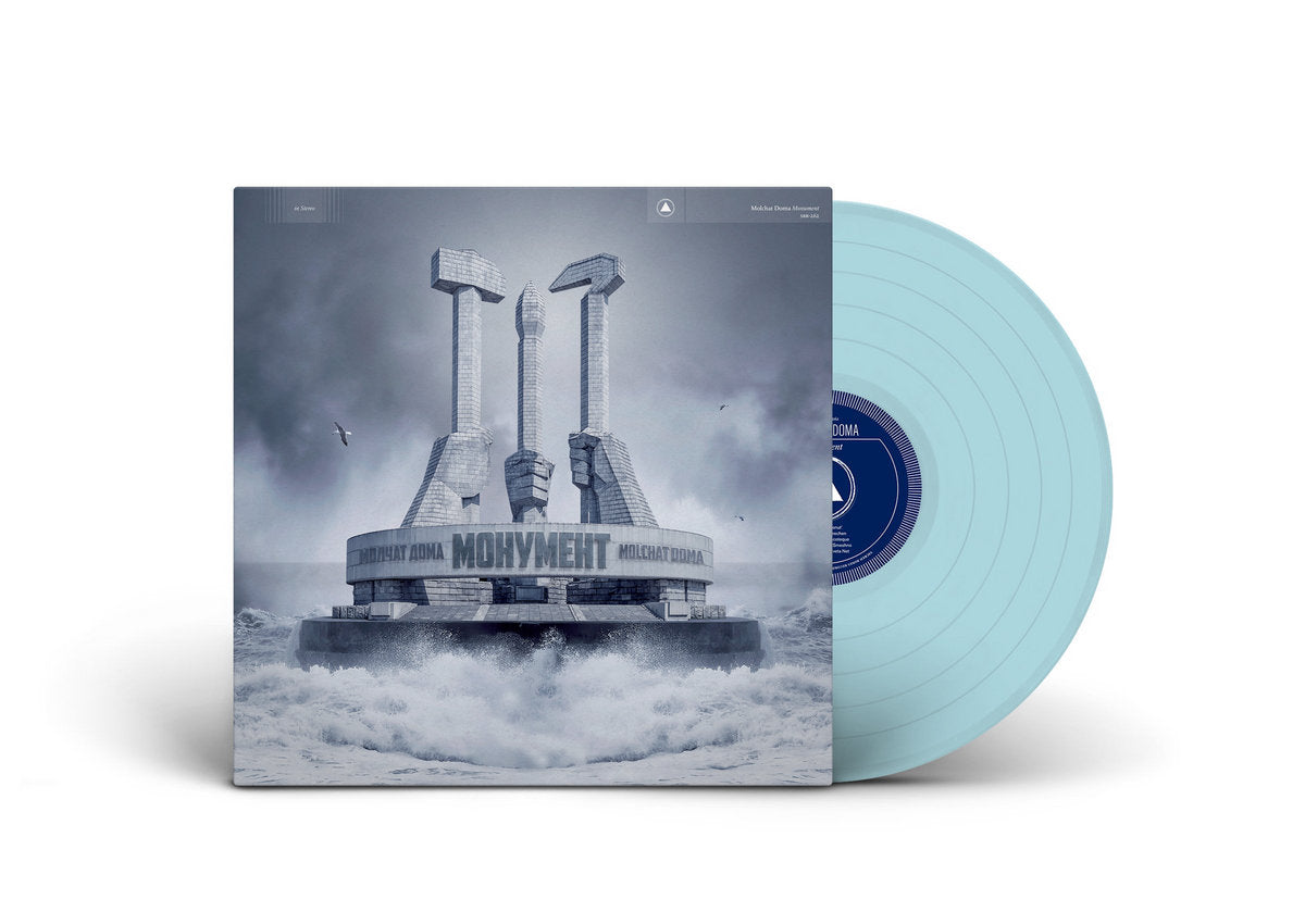 Vinyl record with a blue disc and cover featuring a futuristic design.
