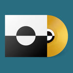 Vinyl record with geometric design on a teal background