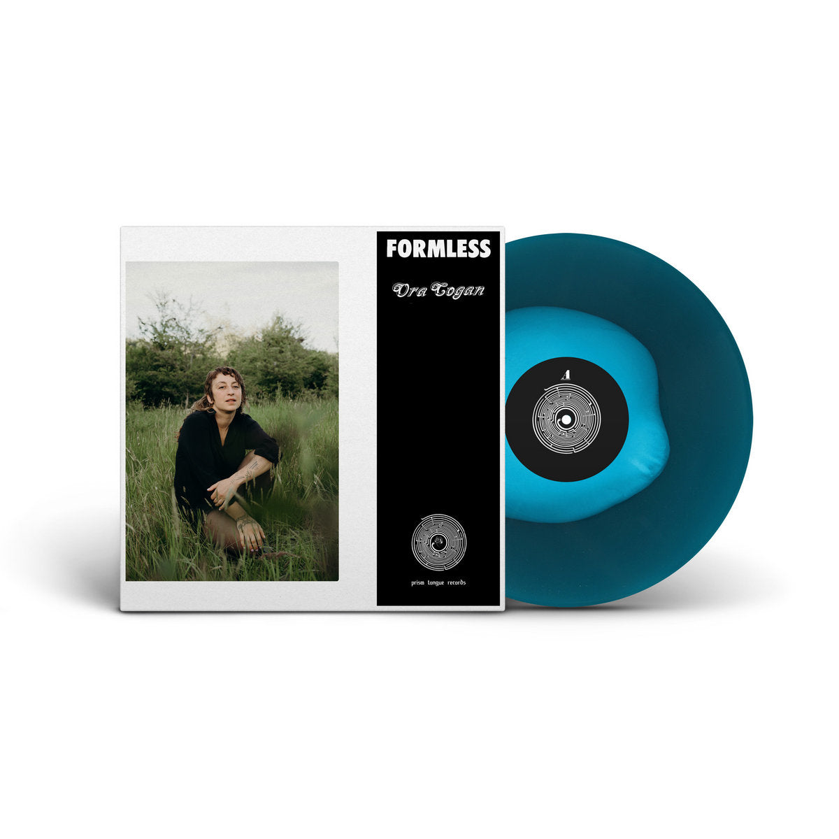 Vinyl record with blue disc and cover featuring a person in a field, labeled 'Formless'.