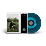 Vinyl record with blue disc and cover featuring a person in a field, labeled 'Formless'.