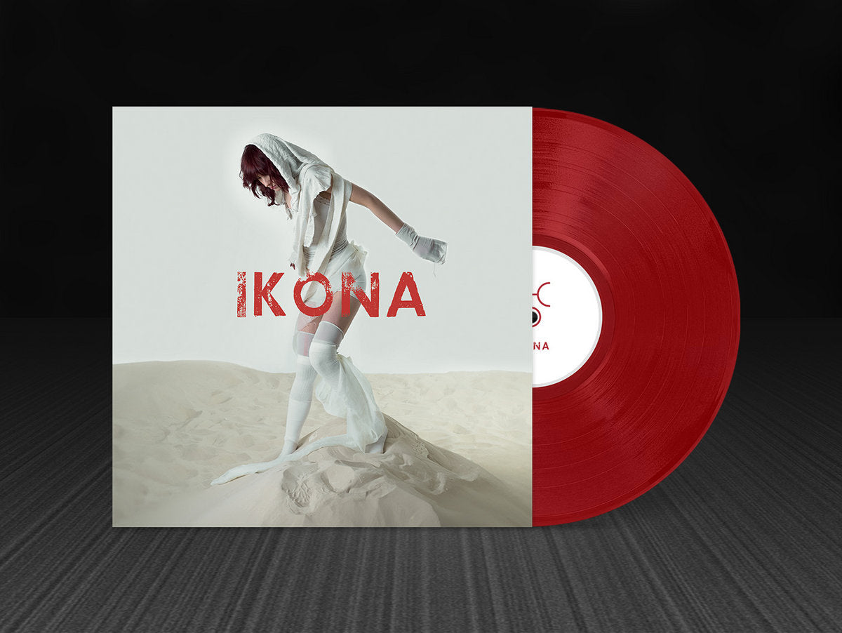 Vinyl record with a person in white on the cover and red disc, featuring the word 'IKONA'.
