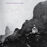 Album cover with a lighthouse on a rocky cliff and text 'Pink Turns Blue Meta'.