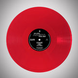 Red vinyl record with a black label on a gray background